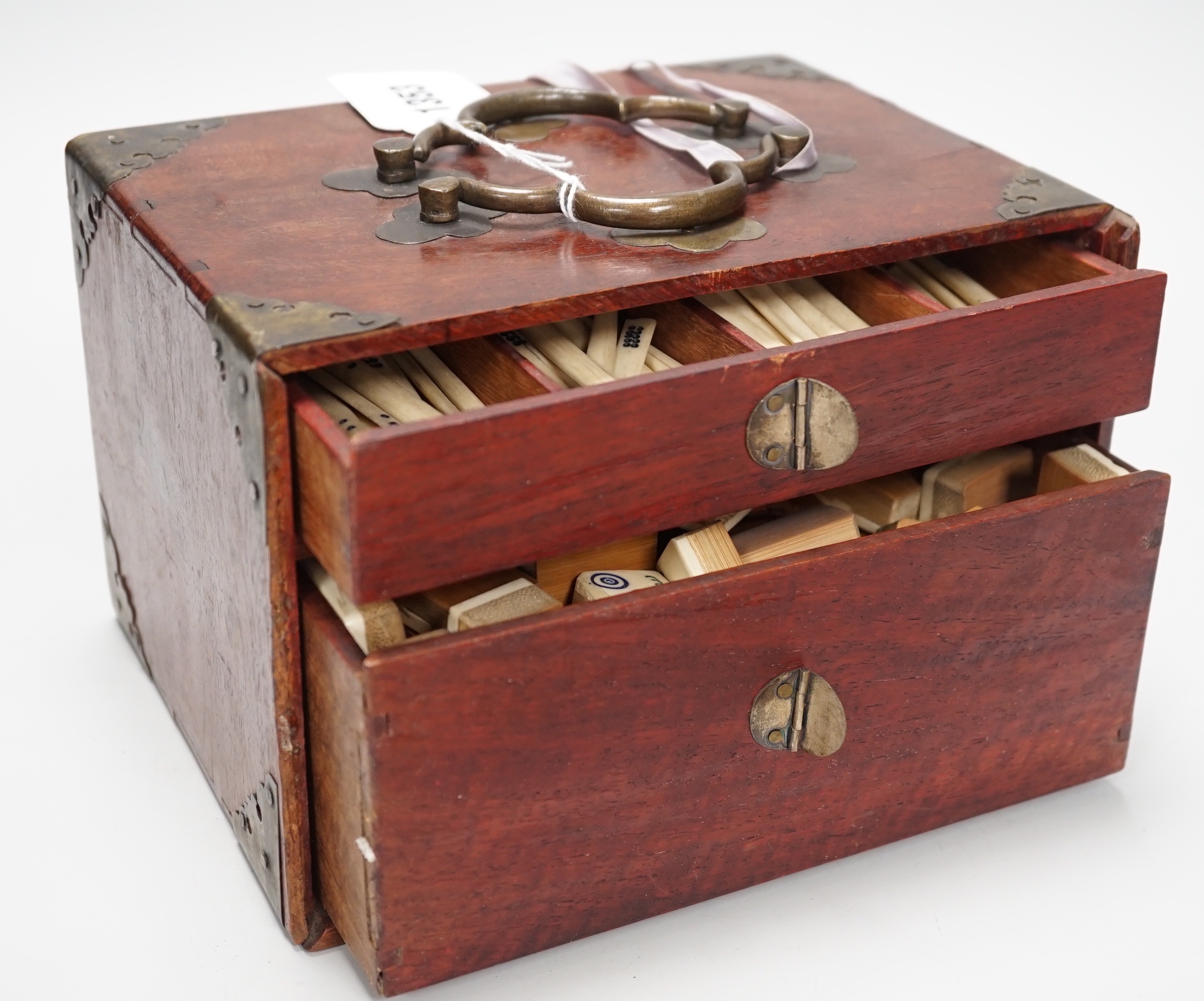 A 20th century MahJong set, together with playing racks with ivorine inlay